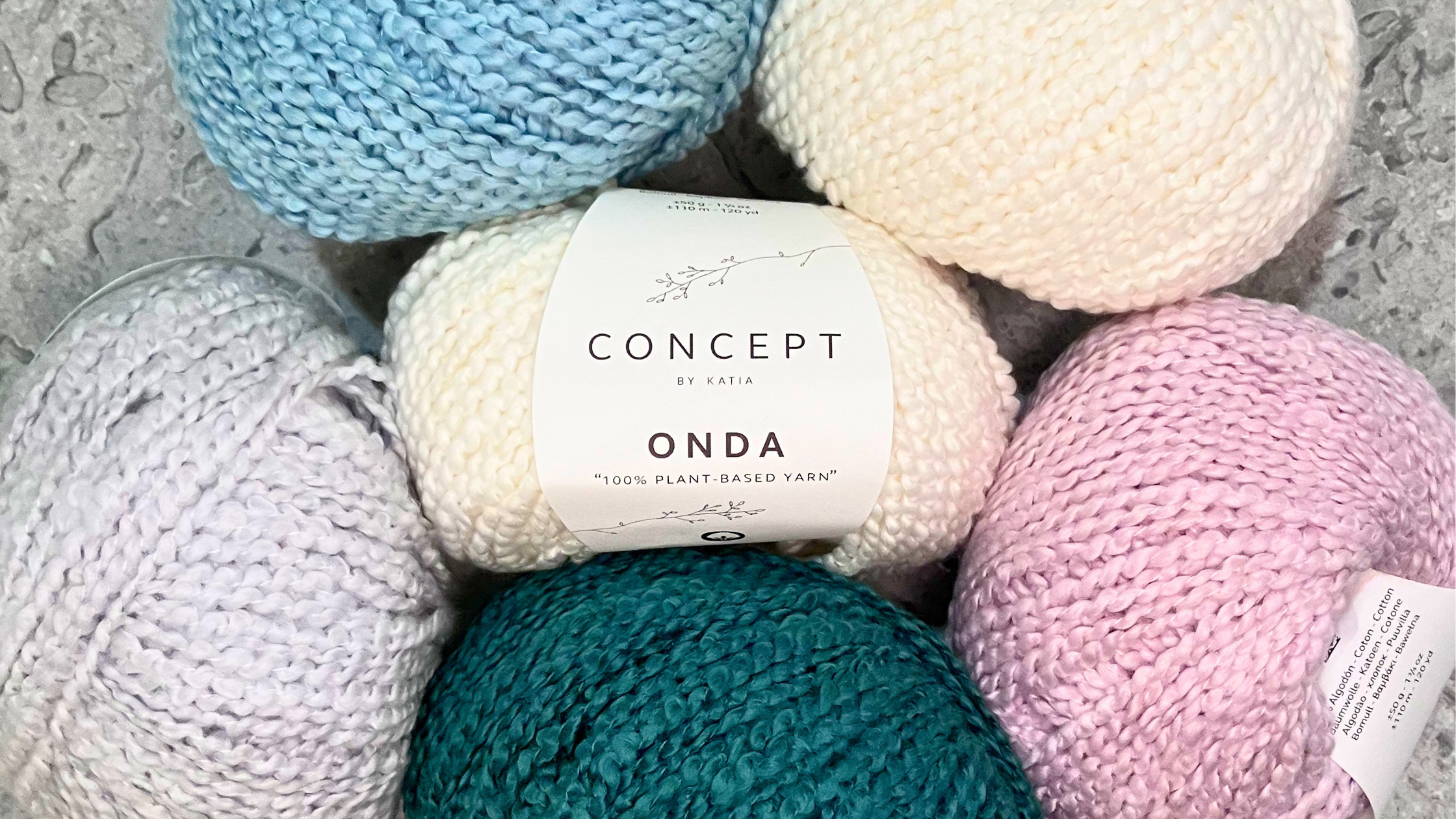Onda bouclé yarn by Concept by Katia — soft cotton loops in pastel tones -- 100% plant-based