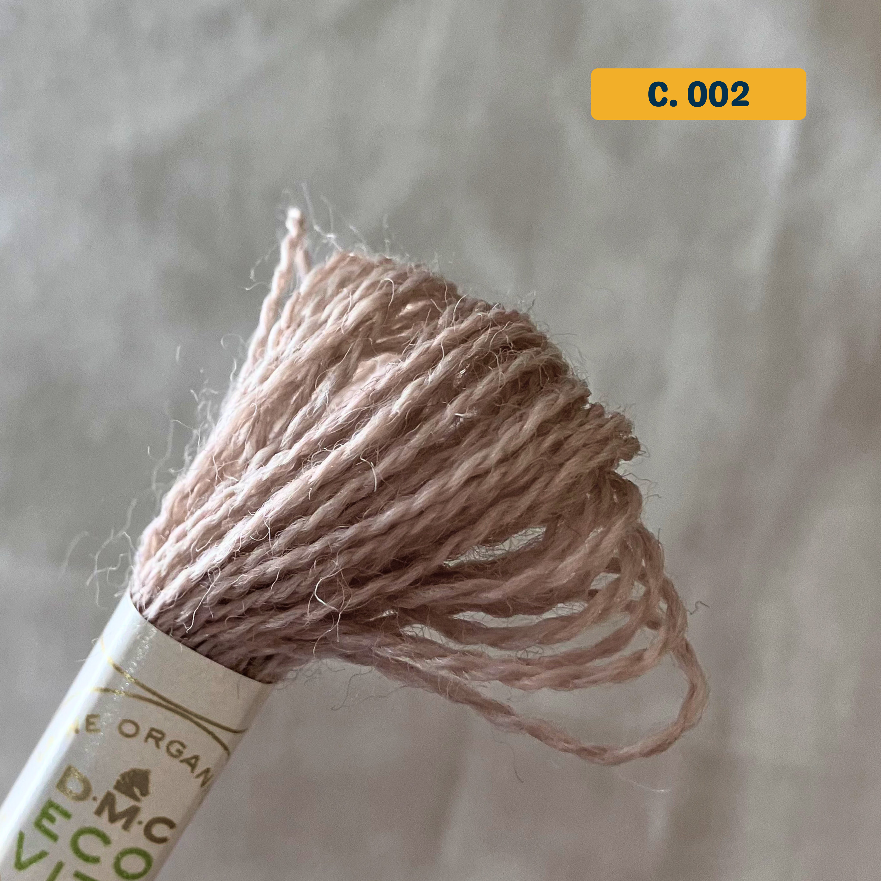 100% Organic Wool Thread — natural beige (002). Naturally-Dyed. 16m. 'Organic DMC ECO VITA' label visible. 