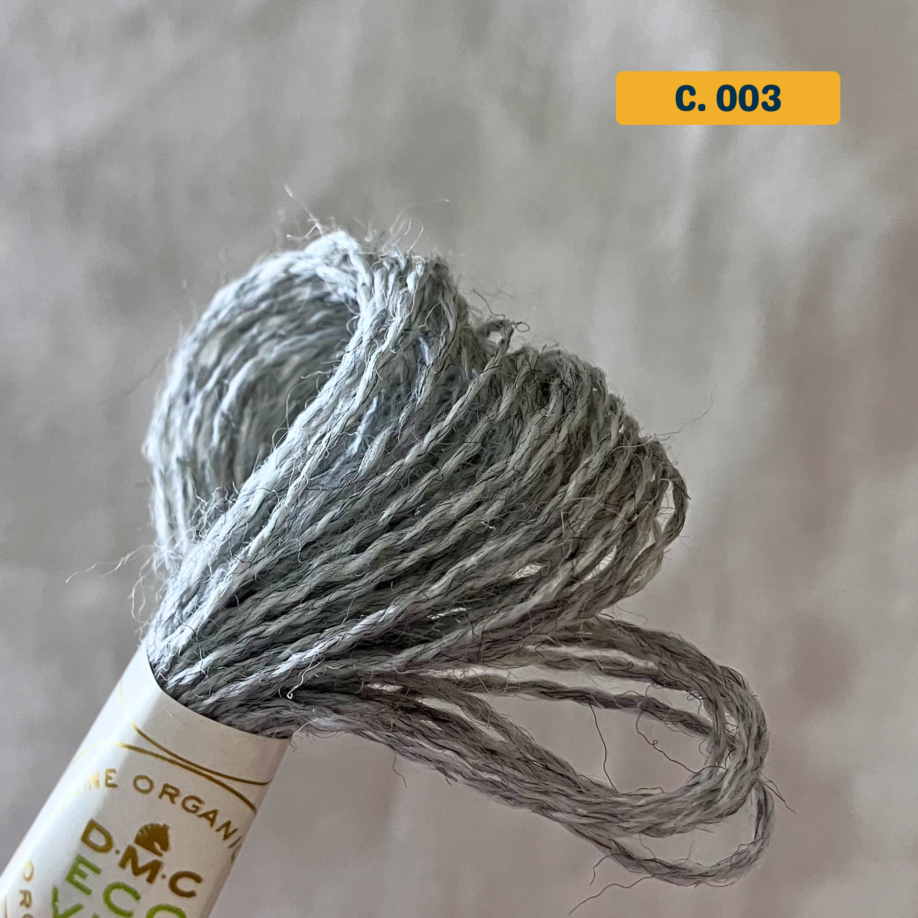100% Organic Wool Thread — natural light grey (003). Naturally-Dyed. 16m. 'Organic DMC ECO VITA' label visible. 