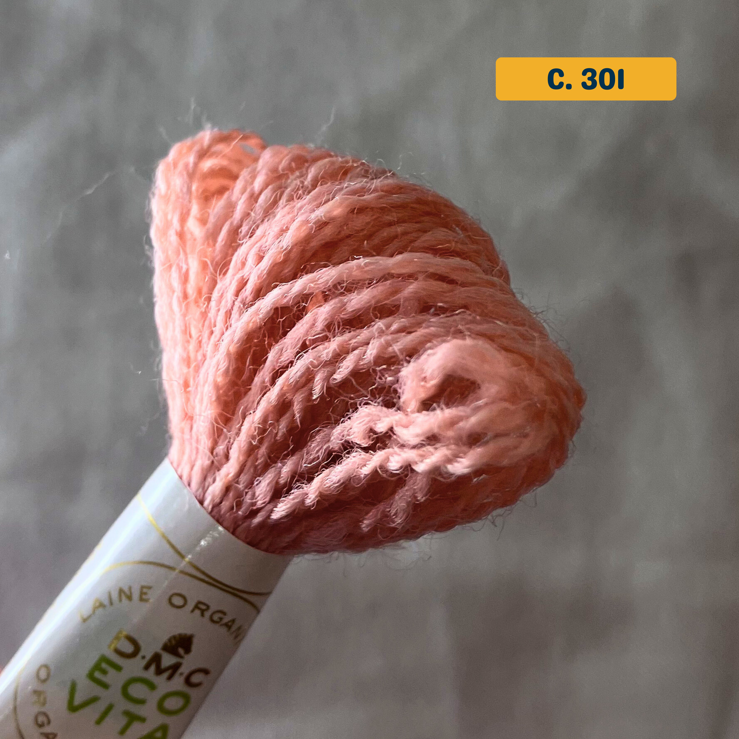 100% Organic Wool Thread — coral (301). Naturally-Dyed. 16m. 'Organic DMC ECO VITA' label visible. 