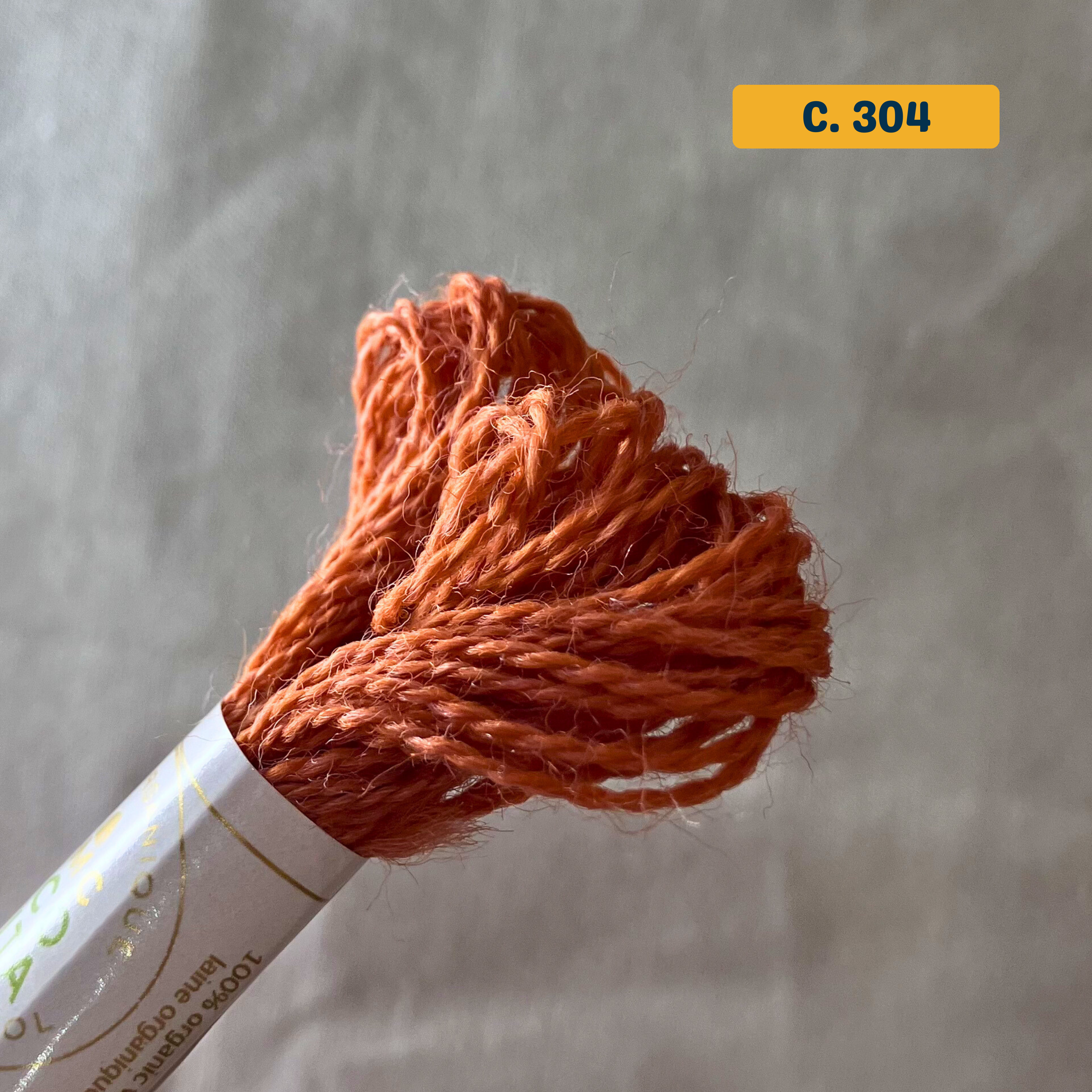 100% Organic Wool Thread — orange (304). Naturally-Dyed. 16m. 'Organic DMC ECO VITA' label visible. 