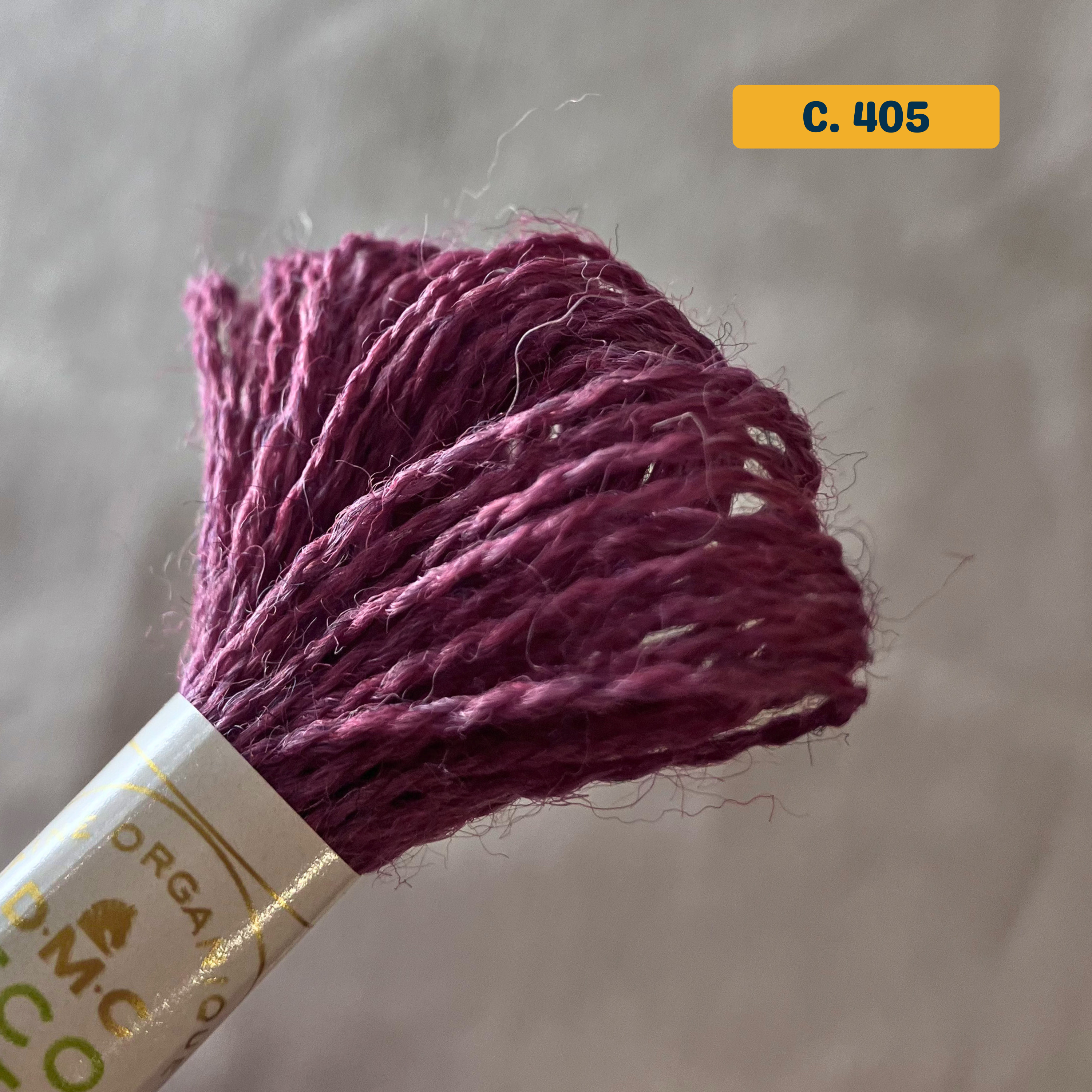 100% Organic Wool Thread — pink-purple (405). Naturally-Dyed. 16m. 'Organic DMC ECO VITA' label visible. 