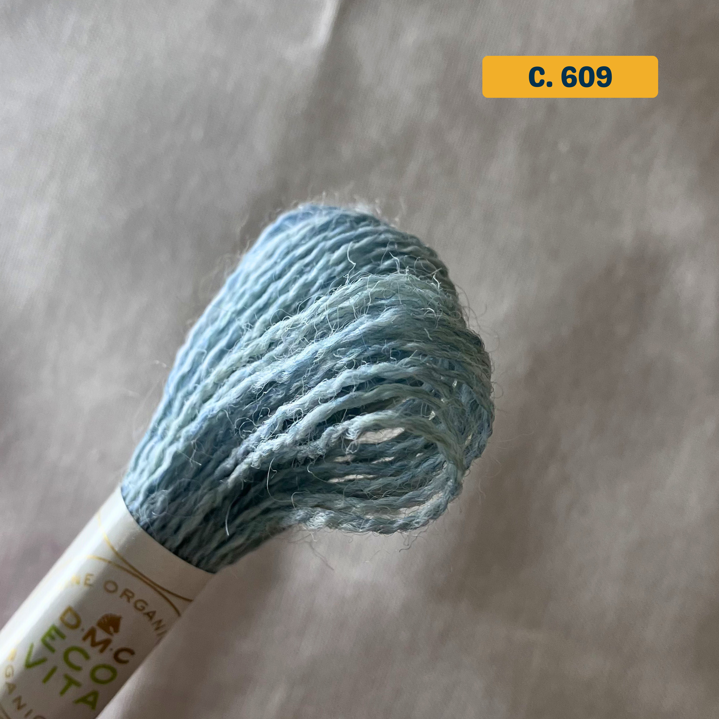 100% Organic Wool Thread — light blue (609). Naturally-Dyed. 16m. 'Organic DMC ECO VITA' label visible. 