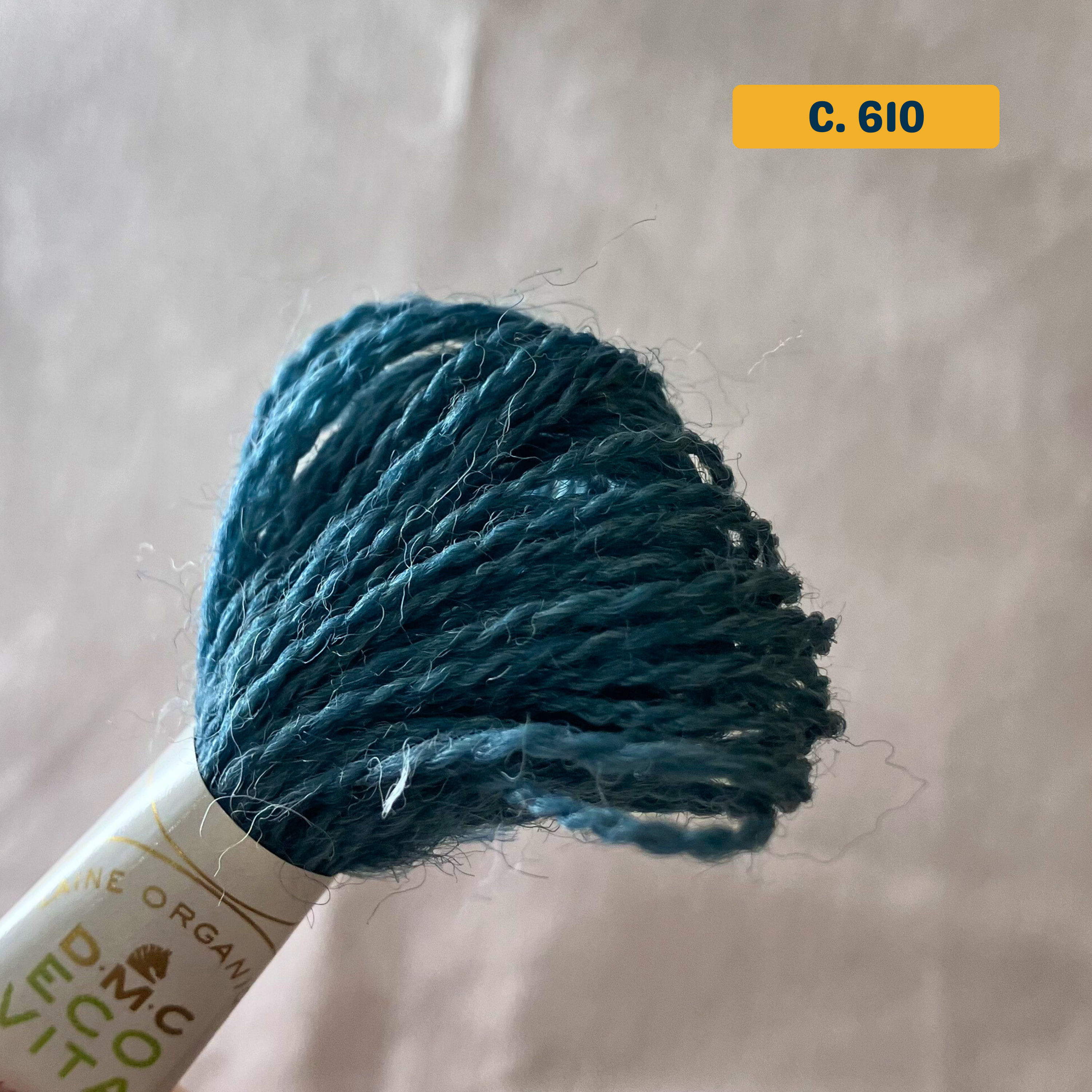 100% Organic Wool Thread — dark turquoise (610). Naturally-Dyed. 16m. 'Organic DMC ECO VITA' label visible. 