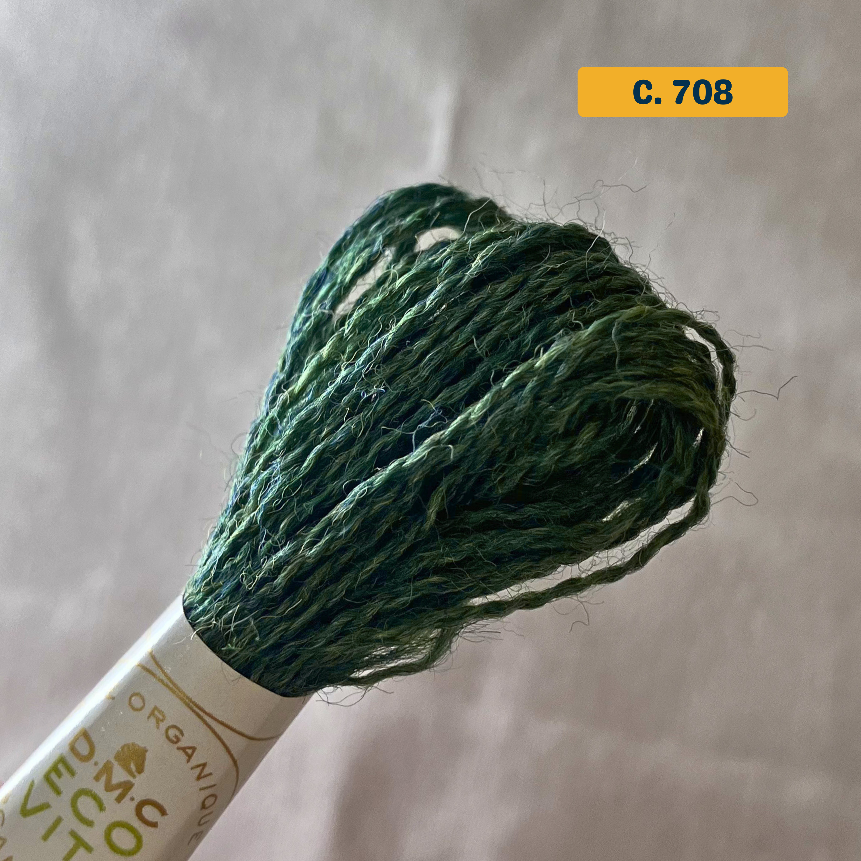 100% Organic Wool Thread — dark green (708). Naturally-Dyed. 16m. 'Organic DMC ECO VITA' label visible. 