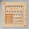 Katia 4-in-1 wooden measuring pack — knitting gauge tool with needle sizer, stitch counter, and ruler. Plastic-free.