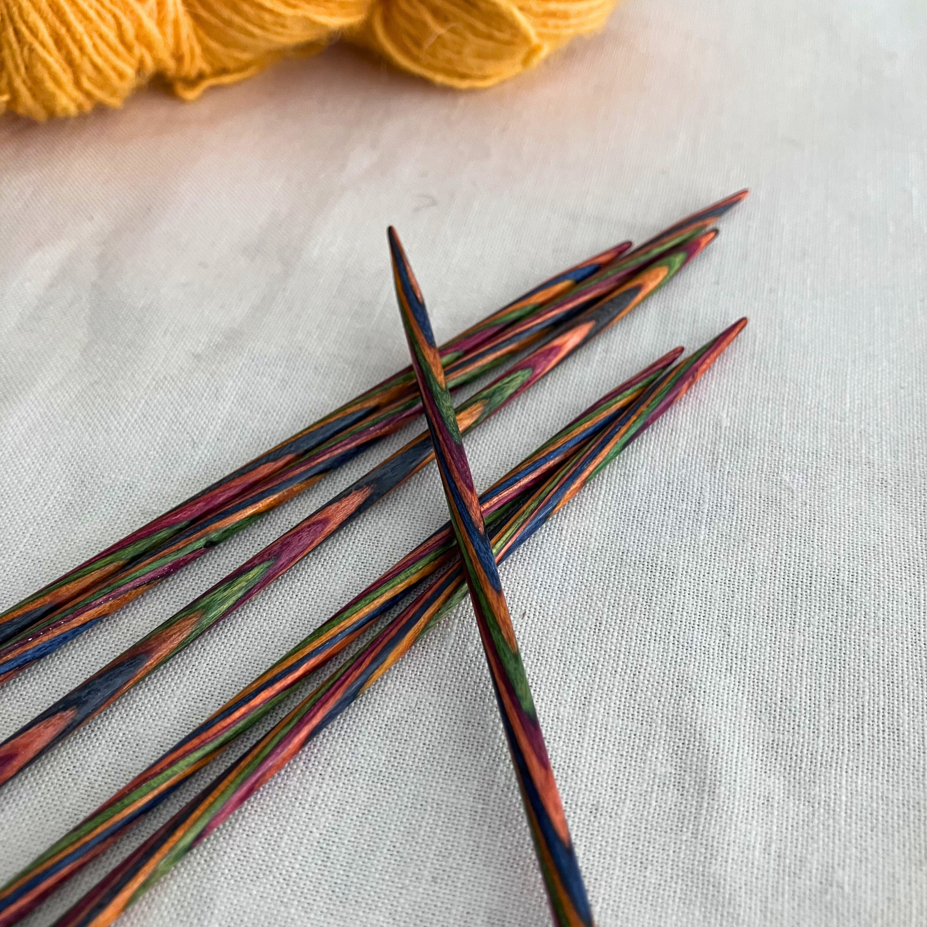 Knit Picks Rainbow Wood double-pointed needles close-up – tapered tips, grooved grip