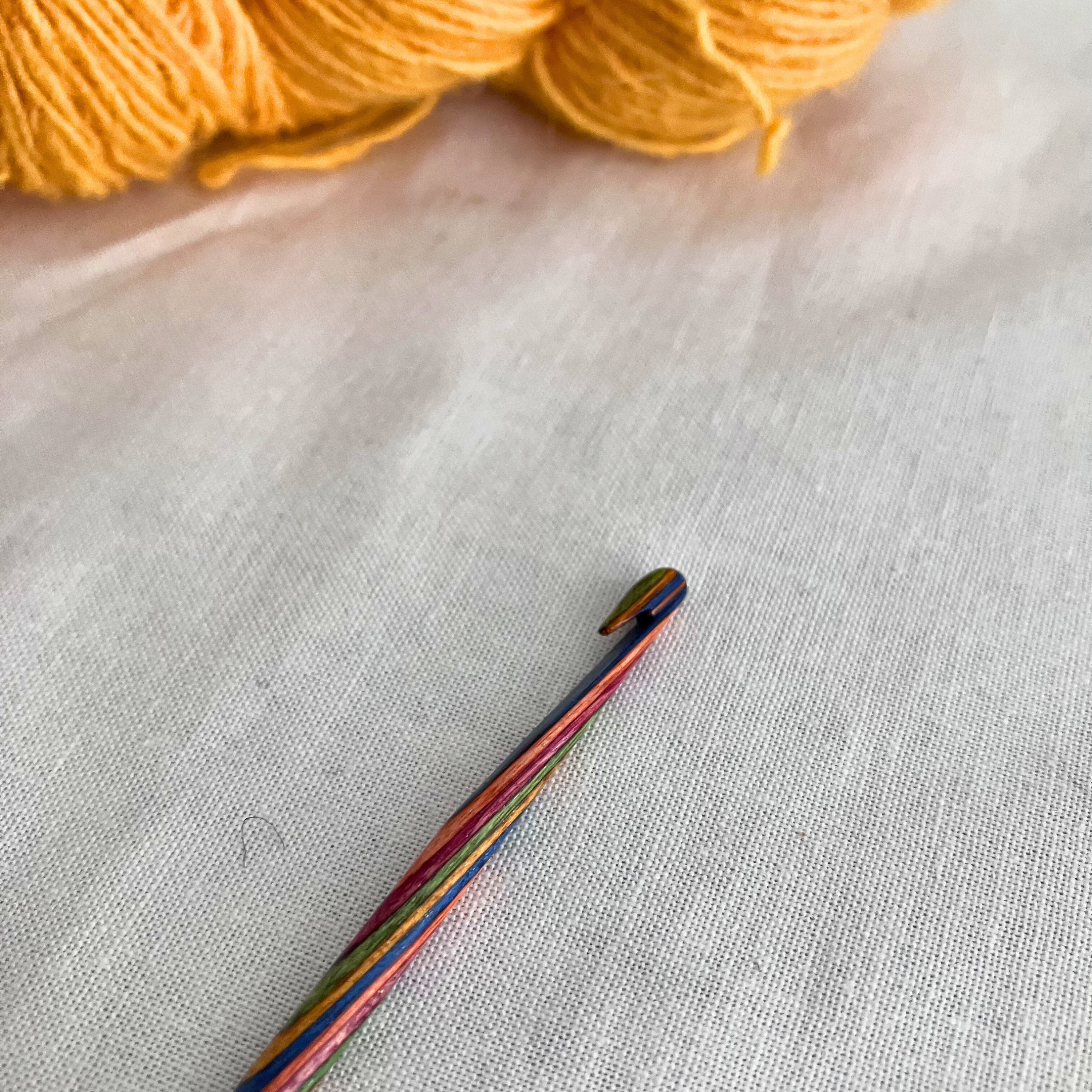 Knit Picks Rainbow Wood crochet hook close-up – smooth finish, ergonomic grip