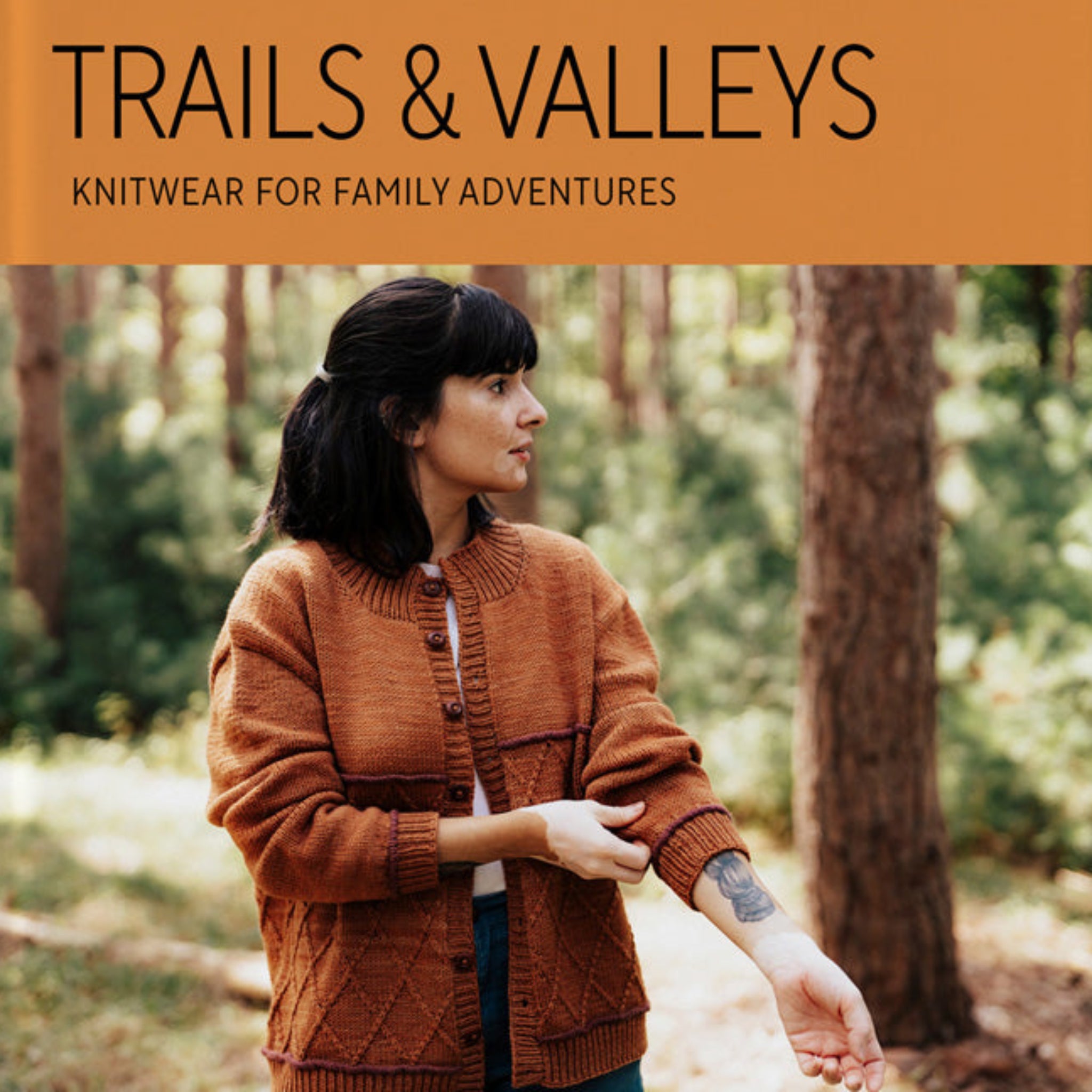 Book cover of 'Trails & Valleys' by Lindsey Fowler with a person wearing a hand-knit textured jacket in a forest setting. From Laine Publishing.