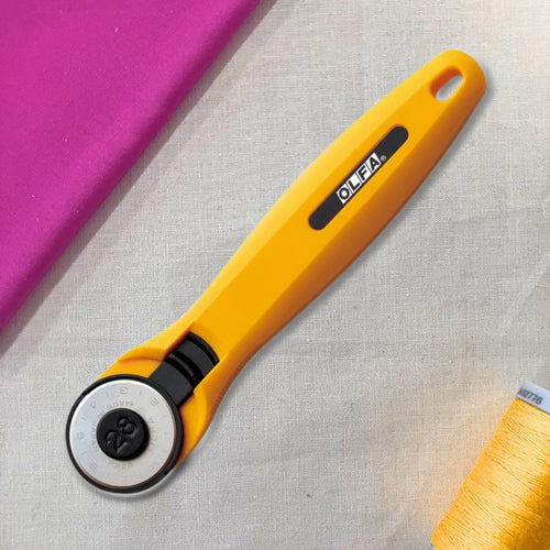 OLFA 28mm Quick-Change Rotary Cutter for small-scale sewing and quilting projects.
