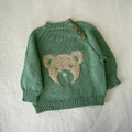 Bora Baby Pullover knitting pattern by Pascuali — infant seamless pullover sweater pattern. Photo courtesy of Pascuali