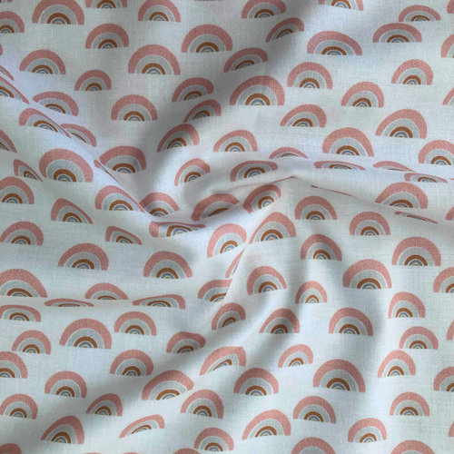 100% cotton quilting fabric — gold, grey & salmon rainbow pattern on a white background. 44/45in width.