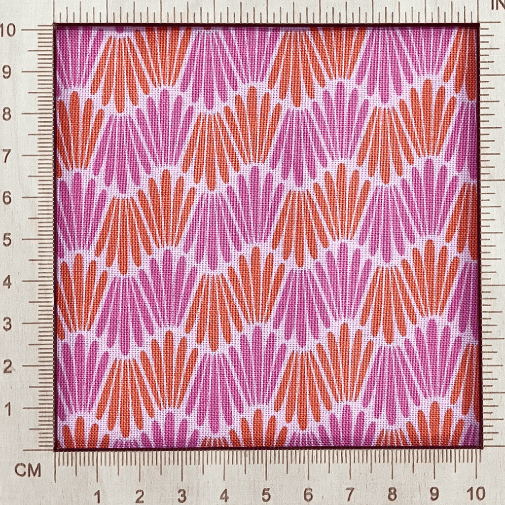 4"x4" scale — 100% cotton quilting fabric — fabric with pink & orange wavy lines. 44/45in width.