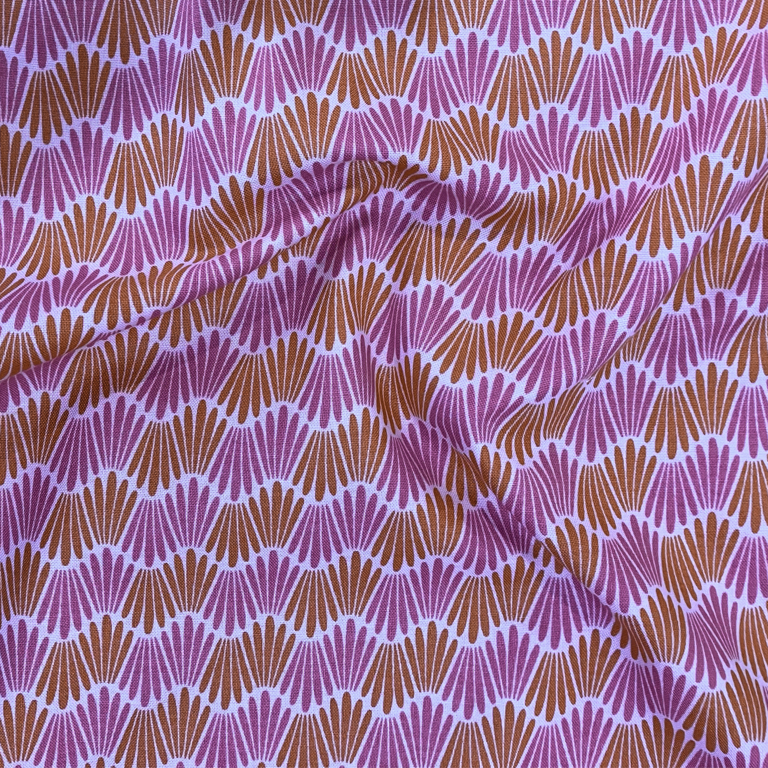 100% cotton quilting fabric — fabric with pink & orange wavy lines. 44/45in width.