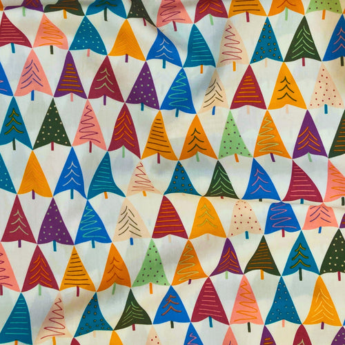 Alpine Mountain quilting cotton — allover mountain and tree silhouette print in multiple colours on a cream background. Art Gallery Fabrics, 44/45″ wide.