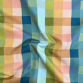 100% cotton quilting fabric — Orange, blue, and green checkered print. 44/45in width.