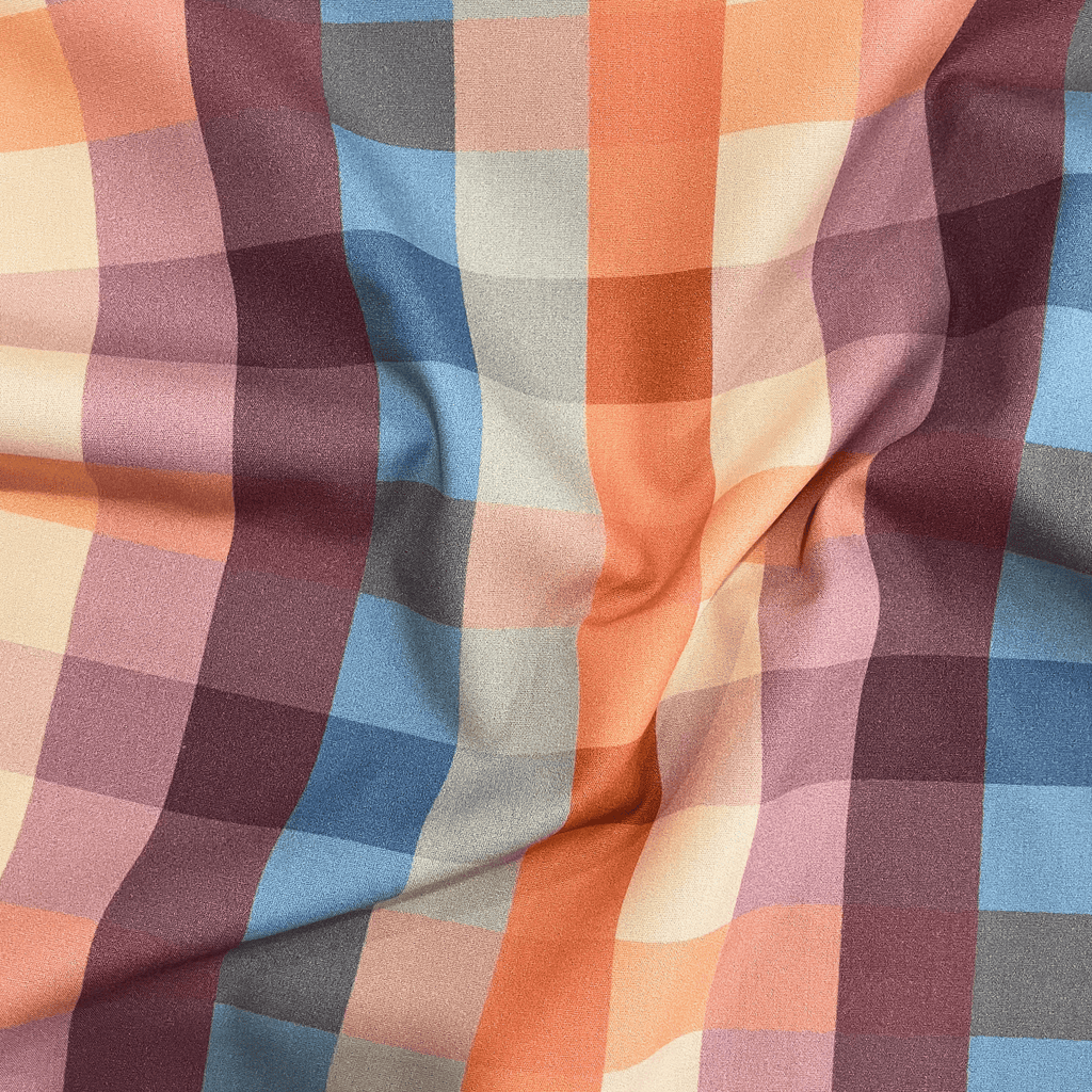 100% cotton quilting fabric — Orange, blue, and purple checkered print. 44/45in width.