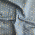 100% cotton quilting fabric — white & yellow daisies on dusty blue. 43/44in width.