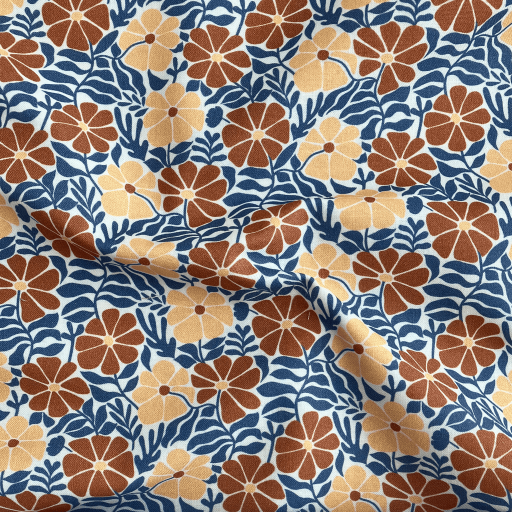 100% cotton quilting fabric — burnt orange & tan flowers with blue-grey leaves on white. 43/44in width.