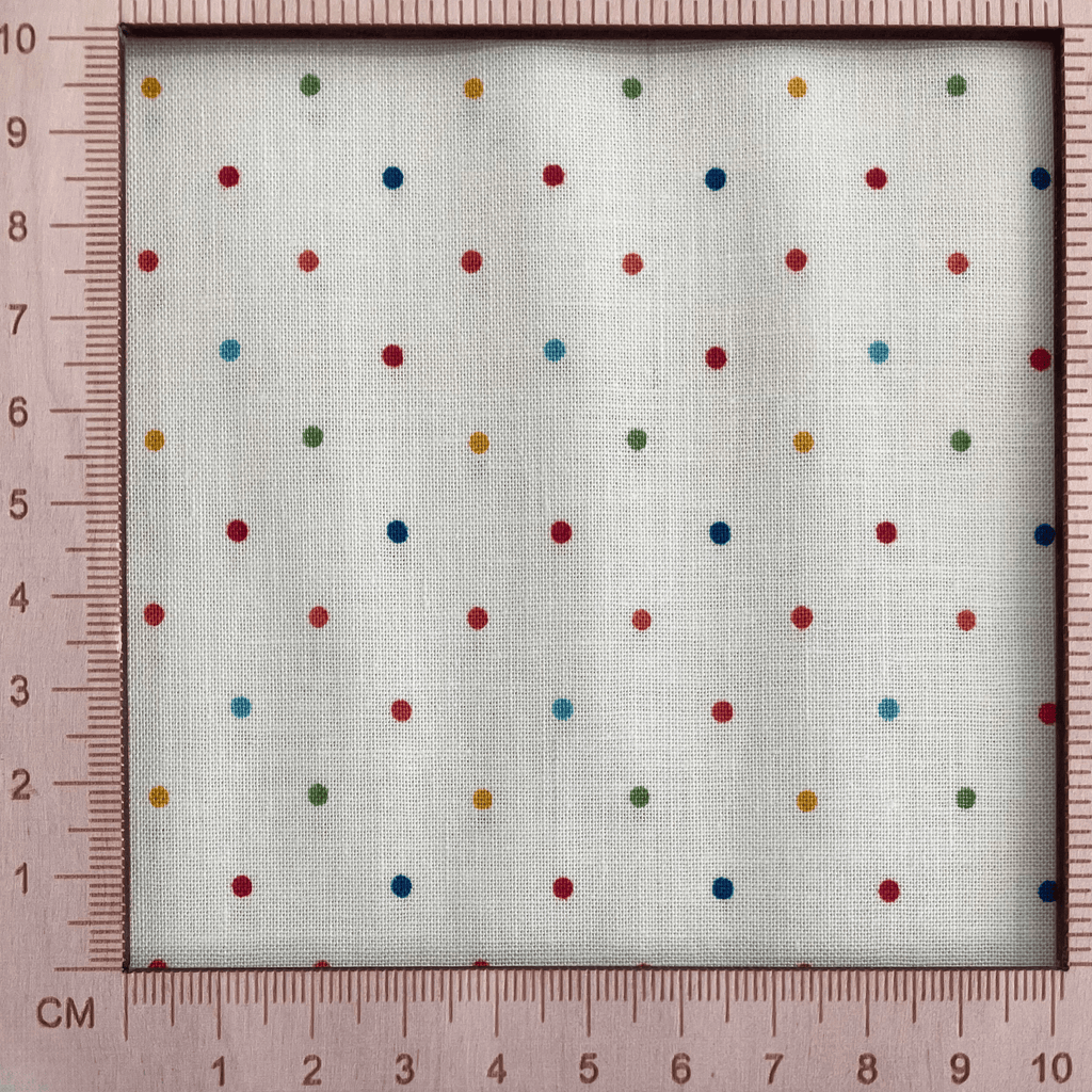 4"x4" scale — 100% cotton quilting fabric — multicolour dots on vanilla cream. 43/44in width.
