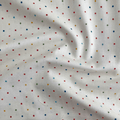 100% cotton quilting fabric — multicolour dots on vanilla cream. 43/44in width.