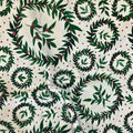 Encircled quilting cotton — painterly holly wreaths and leafy sprigs with red berries on a cream background. Phoebe Fabrics Wintry collection, 43/44″ wide. Canadian.
