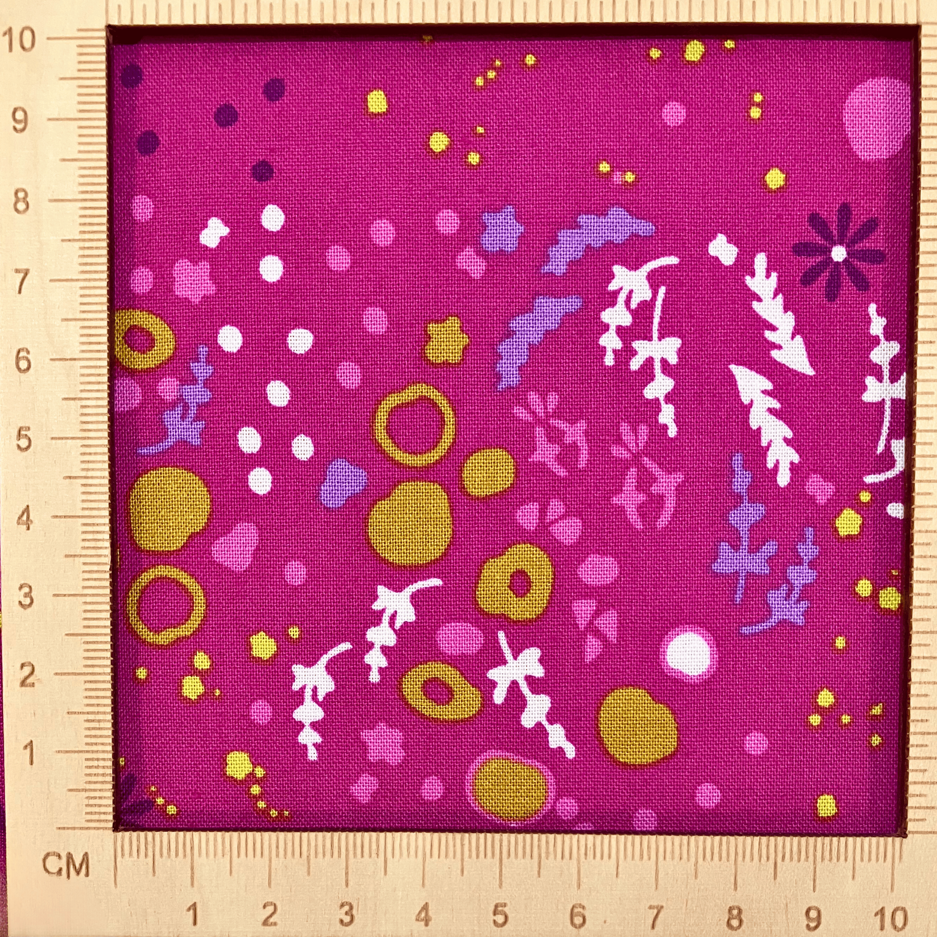 4"x4" scale — 100% cotton quilting fabric — colourful florals & abstract patterns on pink. 44/45in width.