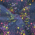 100% cotton quilting fabric — colourful abstract patterns on dark blue-grey. 44/45in width.