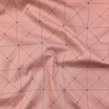 100% cotton quilting fabric — thin green grid lines on dusty pink. 44in width.