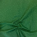 Flurries quilting cotton — scattered white snowflake stars on a rich forest green background. Phoebe Fabrics Wintry collection, 43/44″ wide. Canadian.
