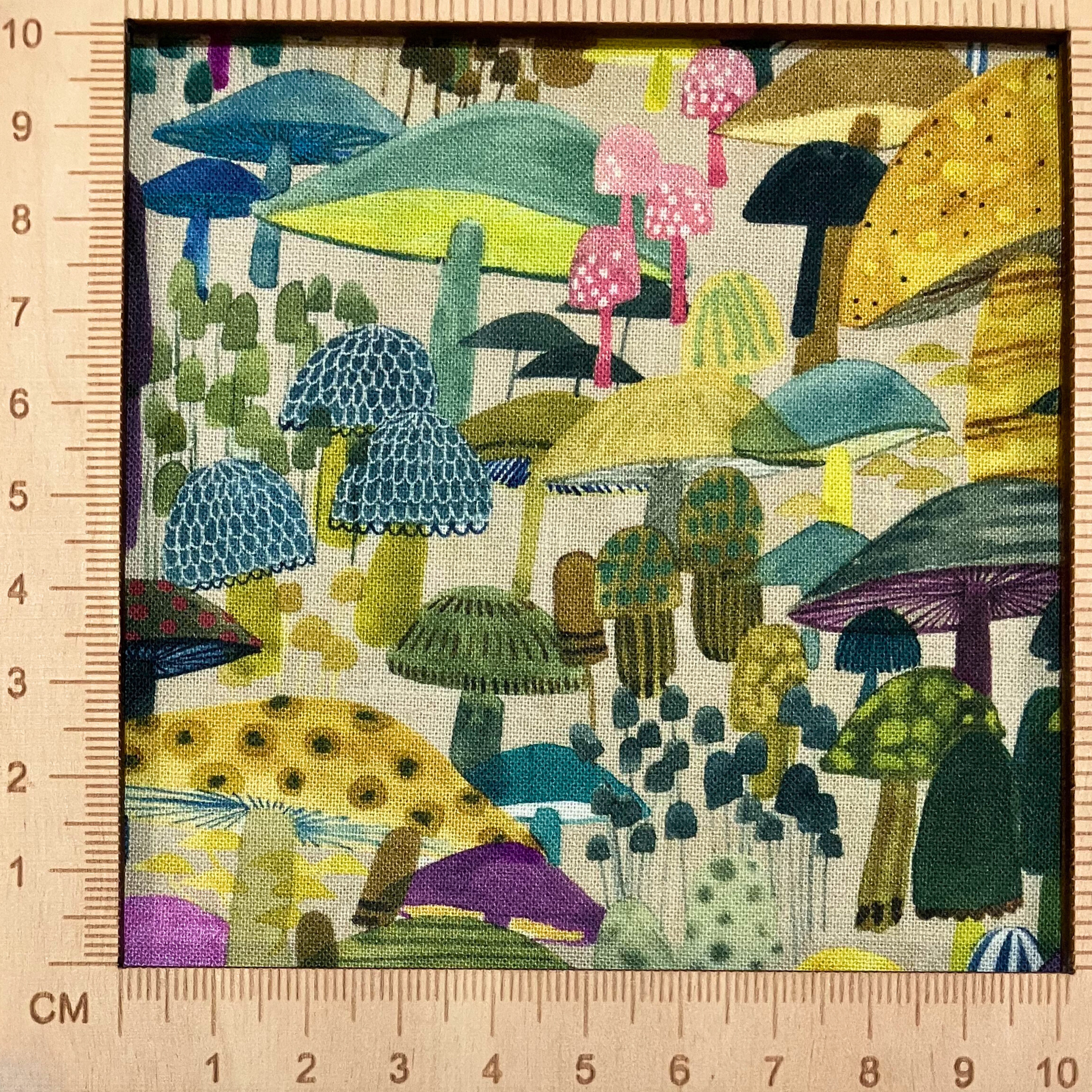 4"x4" scale — 100% cotton quilting fabric — colourful watercolour mushrooms on beige. 44/45in width.