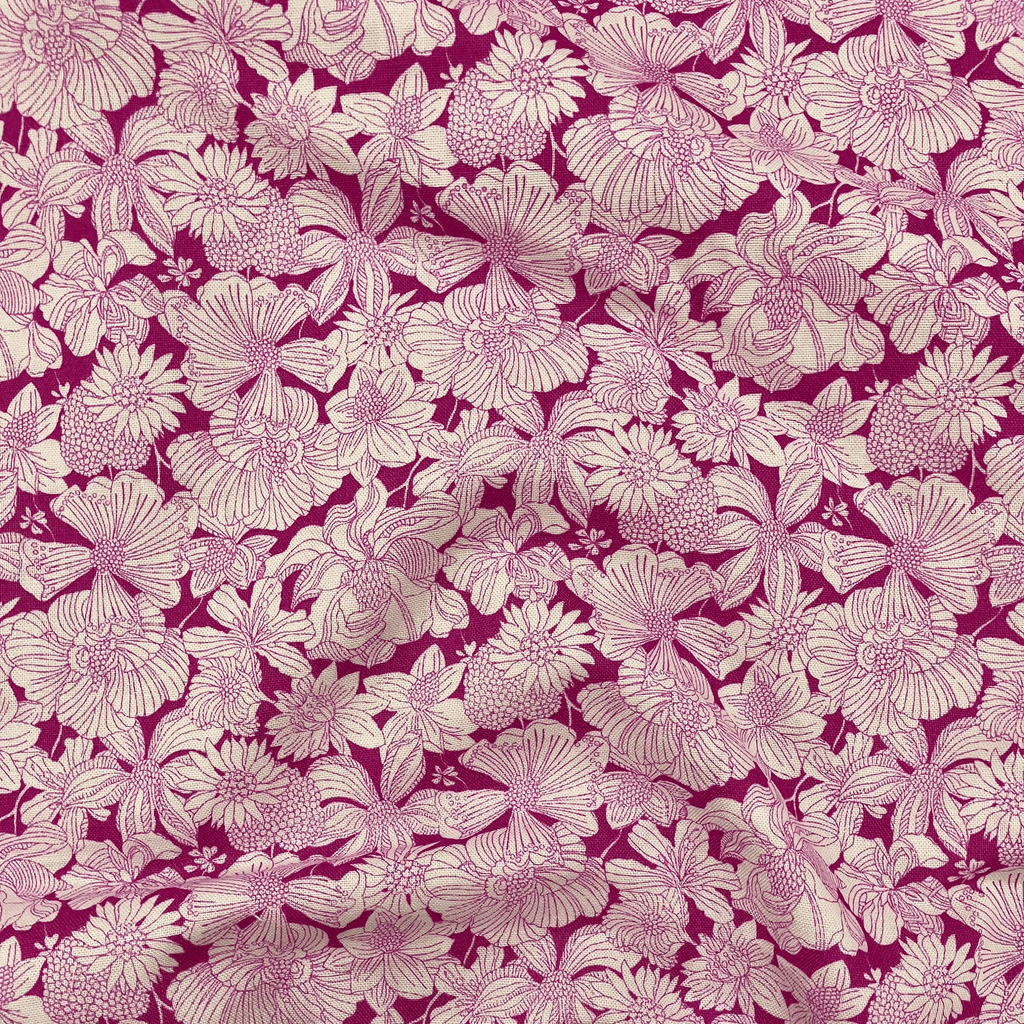 Liberty Fabrics Lasenby cotton — white flowers on bold pink. 44/45in width.