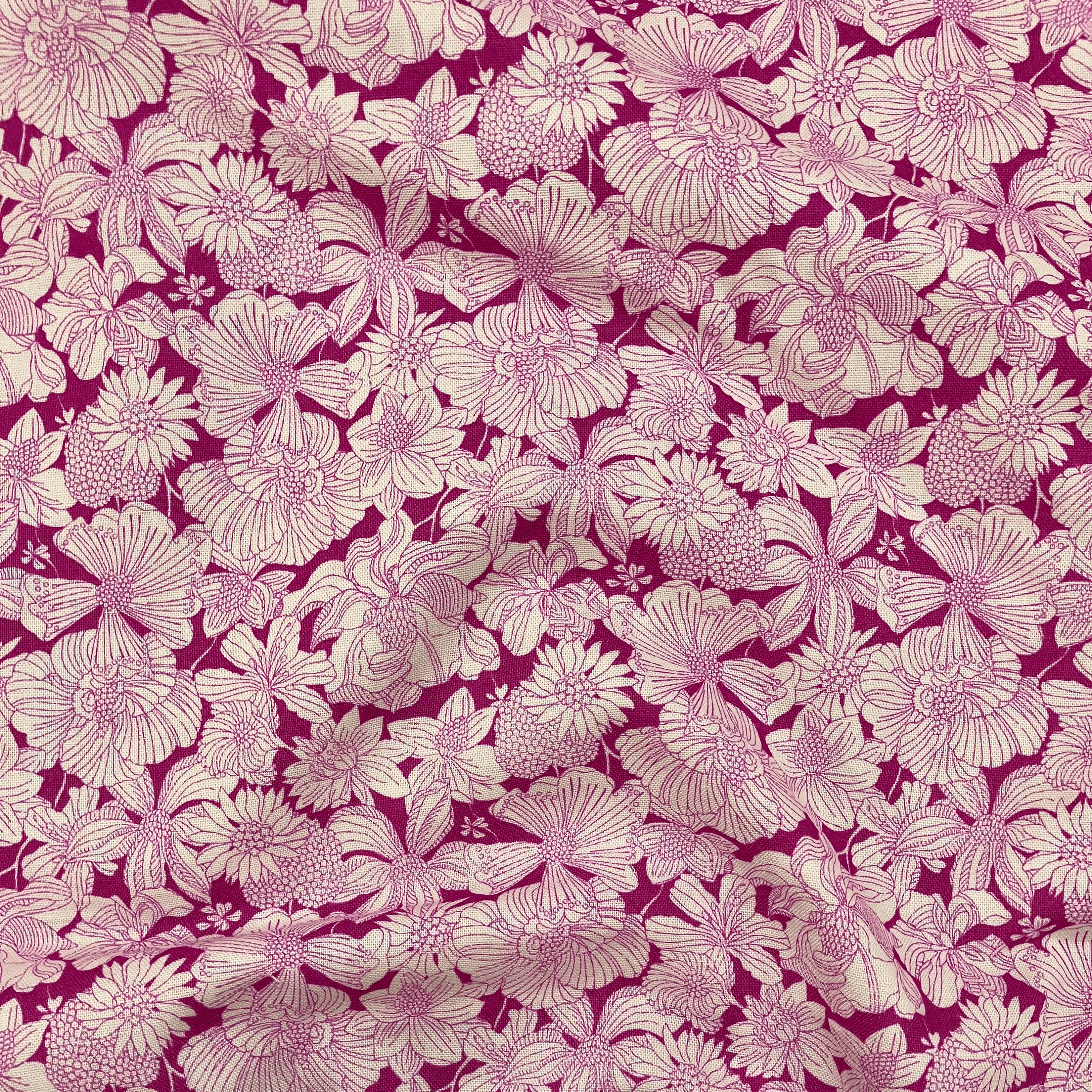 Liberty Fabrics Lasenby cotton — white flowers on bold pink. 44/45in width.