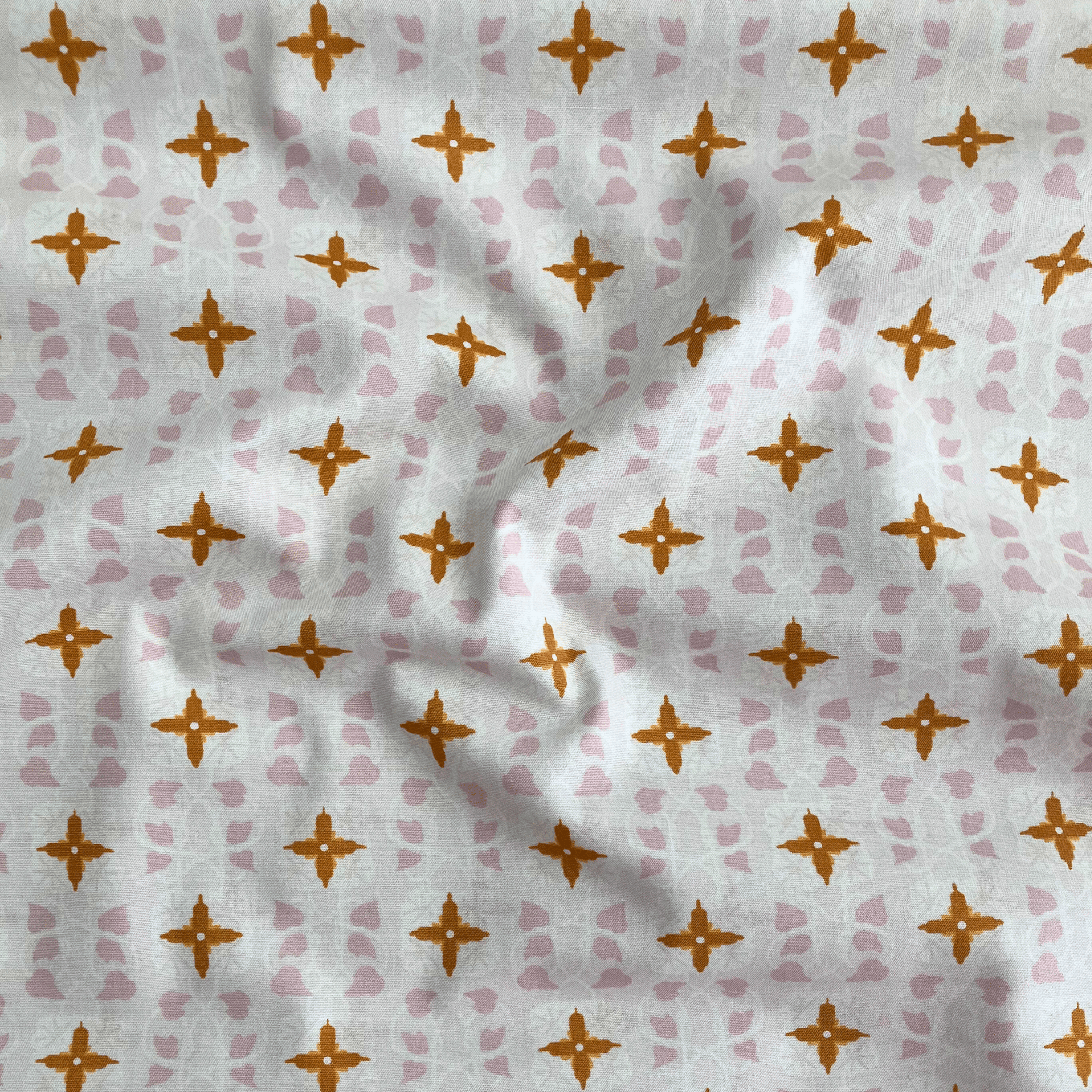 100% cotton quilting fabric — geometric mosaic-inspired pattern on cream. 44/45in width.