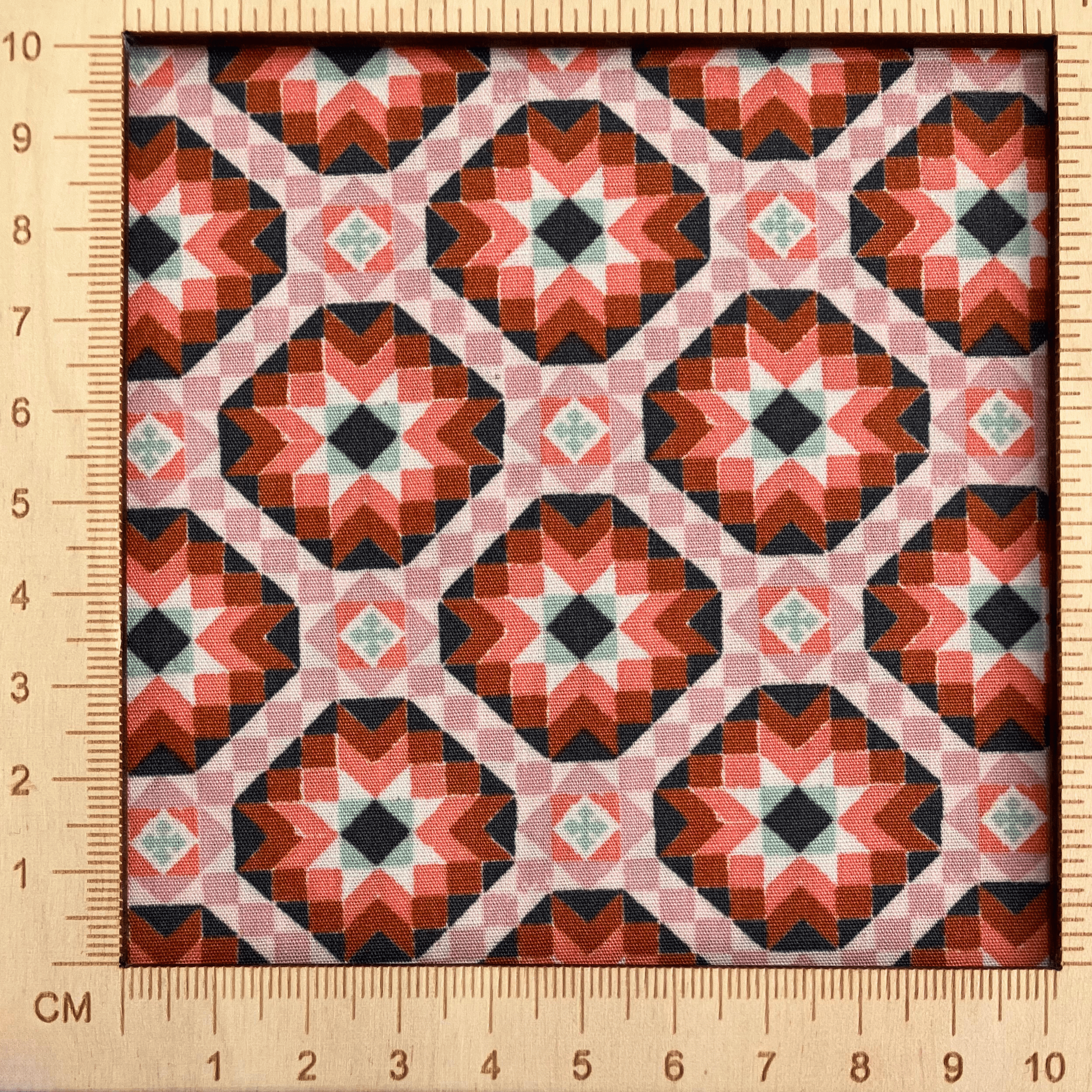 4"x4" scale — 100% cotton quilting fabric — mosaic tile-inspired geometric pattern. 44/45in width.