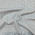 100% cotton quilting fabric — tiny sage green flowers on mint. 44/45in width.