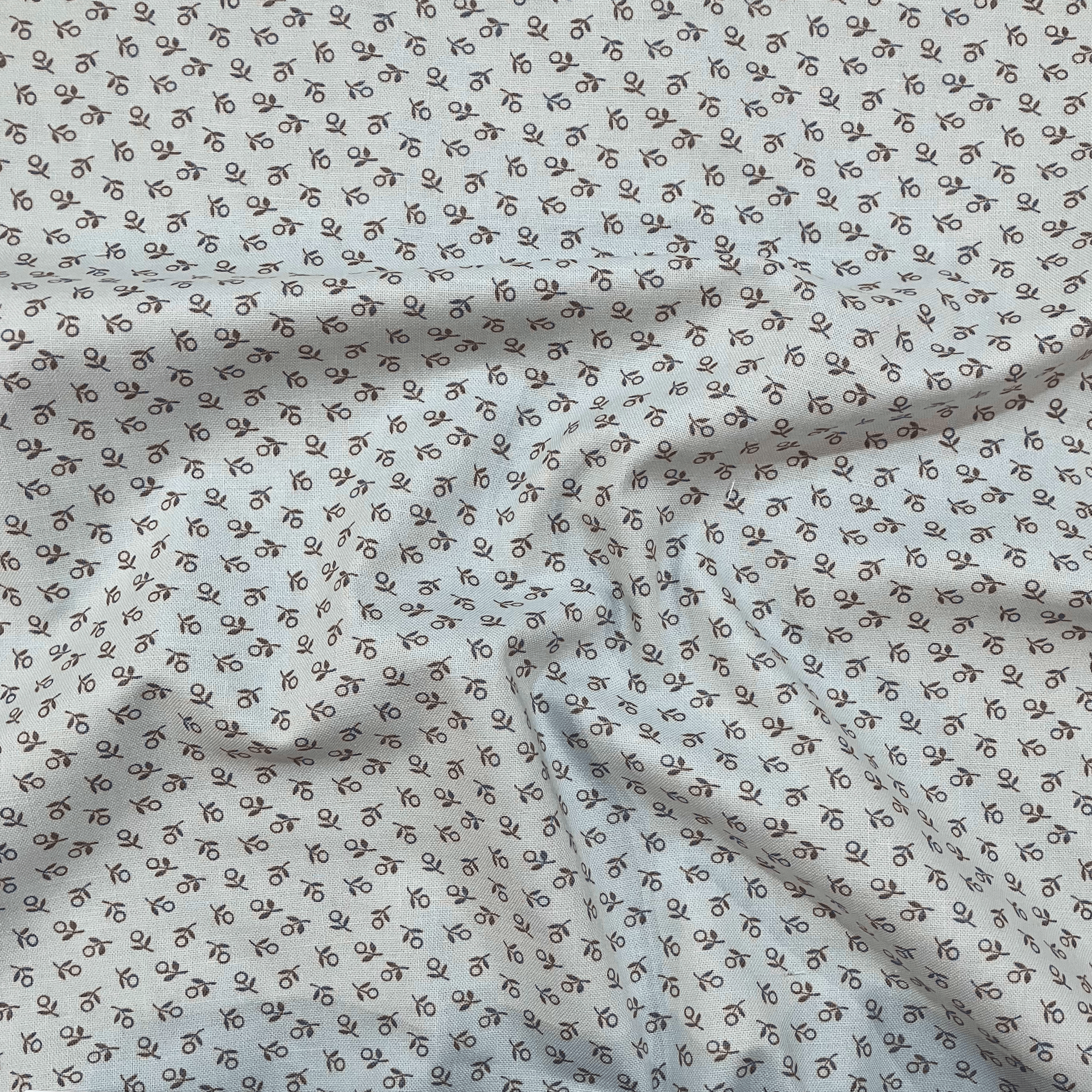 100% cotton quilting fabric — tiny sage green flowers on mint. 44/45in width.