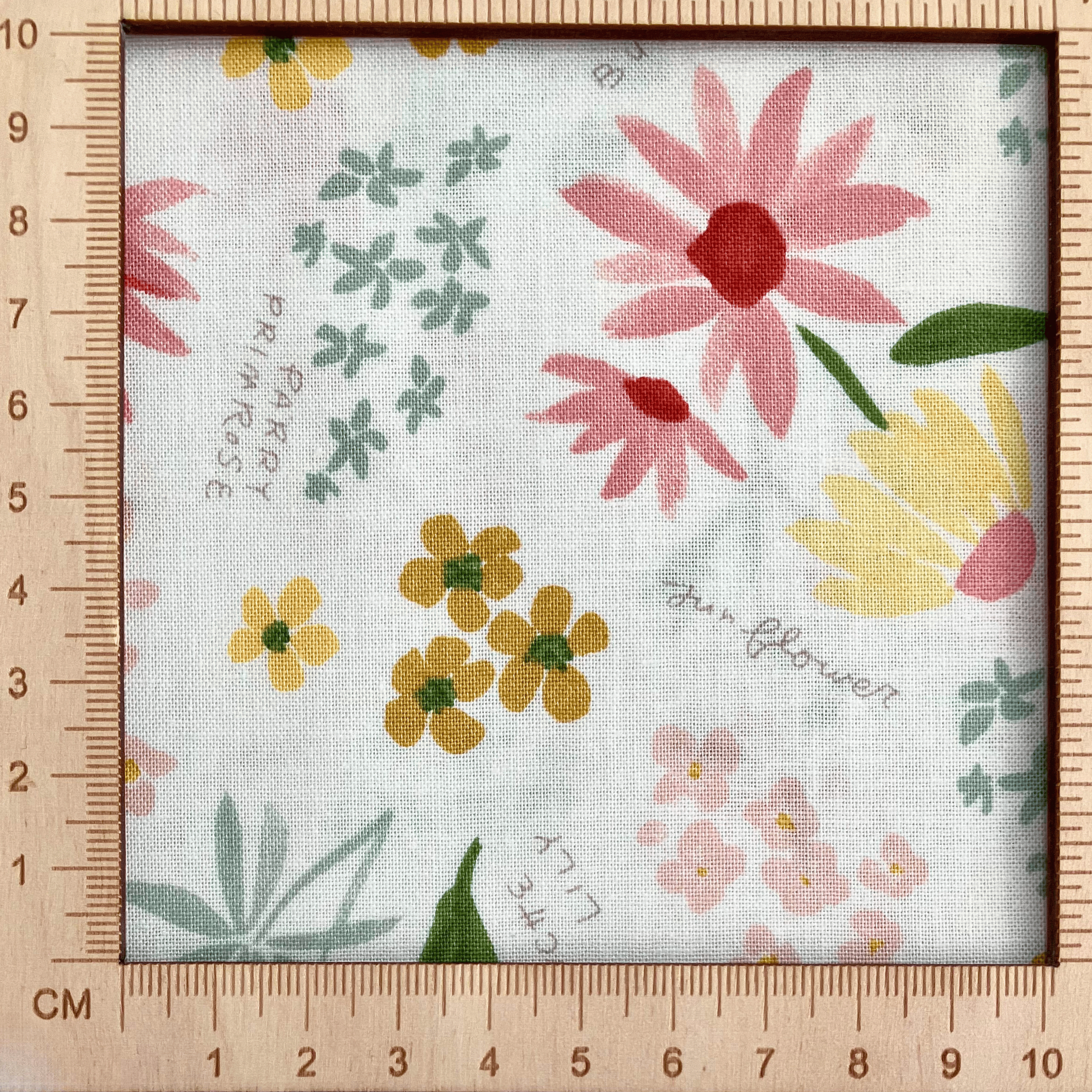 4"x4" scale — 100% cotton quilting fabric — multicoloured labelled flowers on white. 43/44in width.