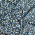 100% cotton quilting fabric — multicoloured flowers with stems on dark green-grey. 43/44in width.