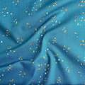 100% cotton quilting fabric — colourful tiny blooms on deep teal. 43/44in width.