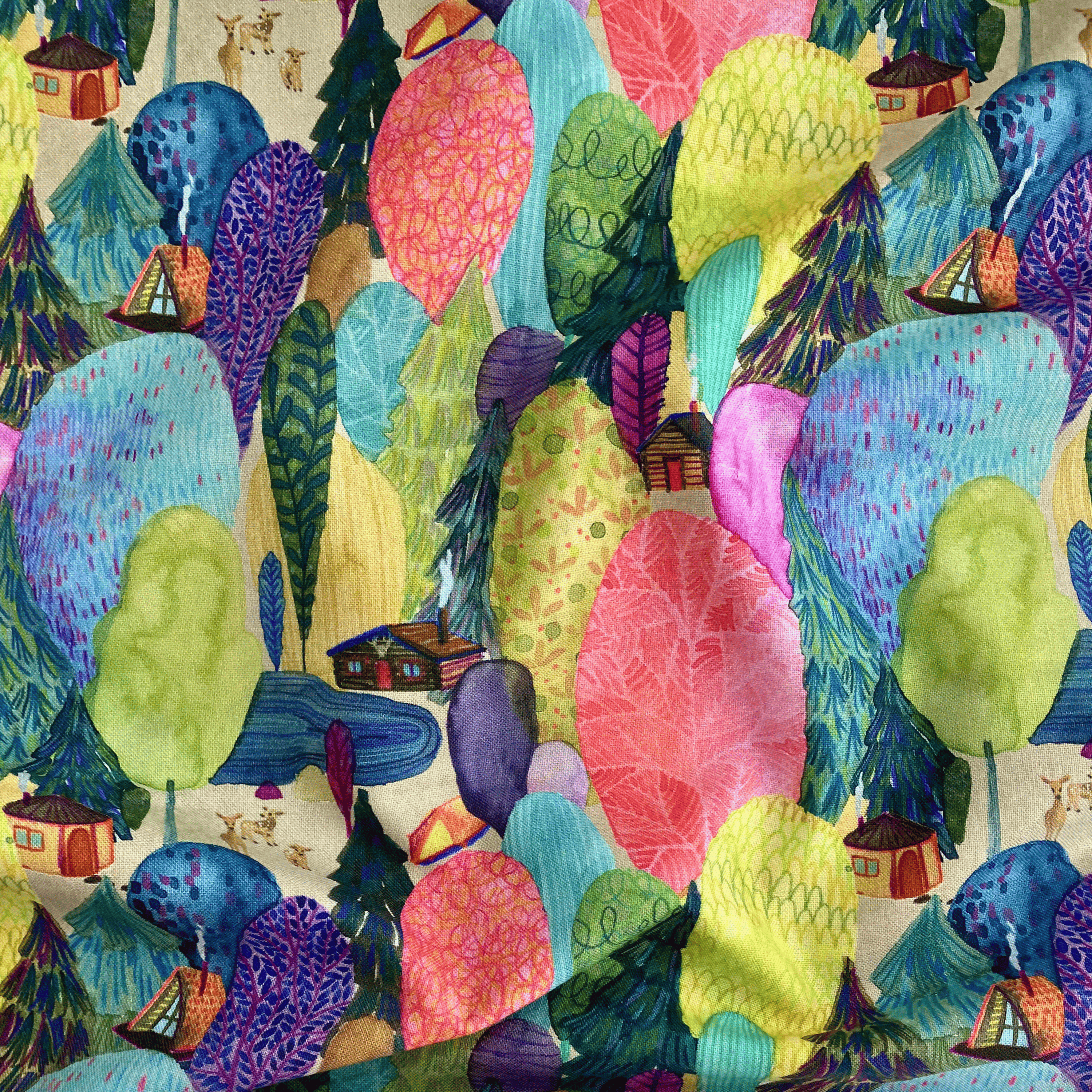 100% cotton quilting fabric — colourful forest scene with trees, deer & cabins. 44/45in width.