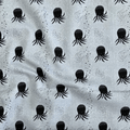 100% cotton quilting fabric — black & white octopus on pale blue-grey. 43/44in width.