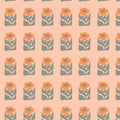 100% cotton quilting fabric — repeating floral pattern featuring stylized orange flowers with gray-green leaves on a soft peach background. 44/45in width.
