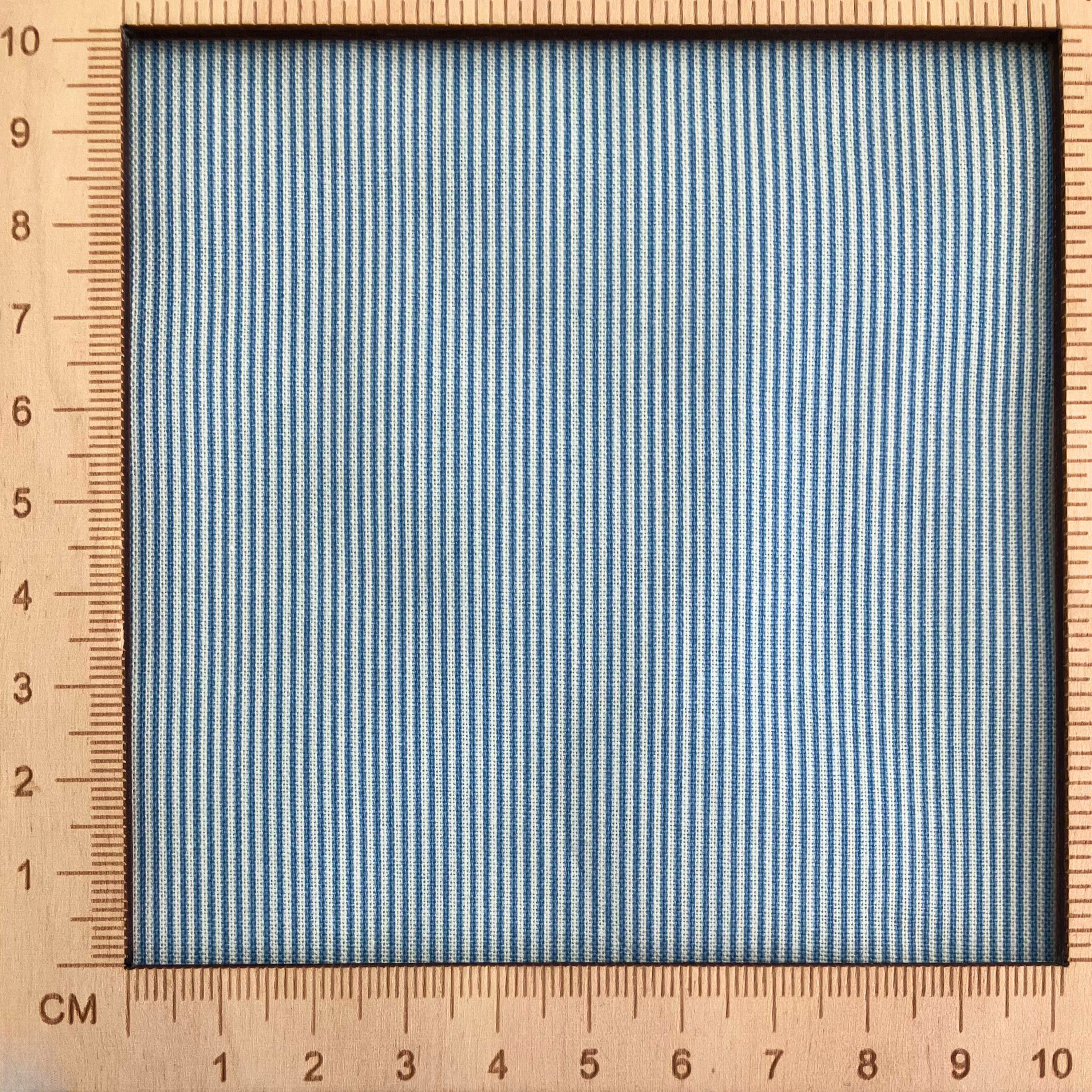 4"x4" scale — 100% cotton quilting fabric — blue & white pin stripes. 44/45in width.