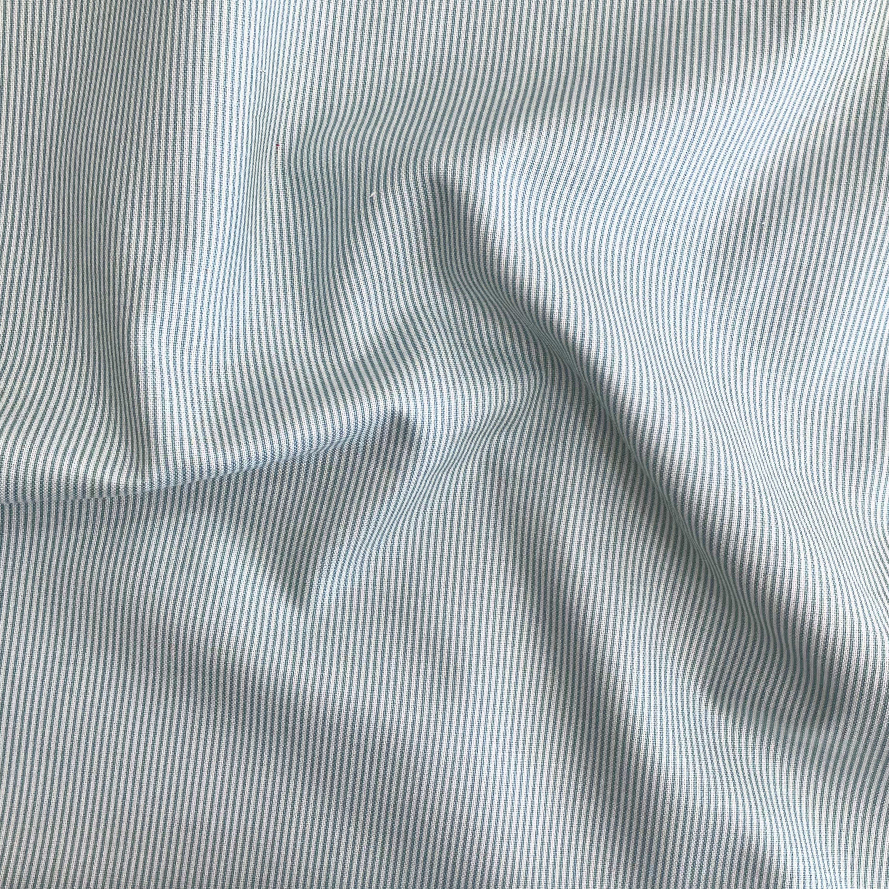 100% cotton quilting fabric — green & white pin stripes. 44/45in width.