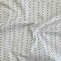 100% cotton quilting fabric — grey & gold pins in chevron pattern on white. 44in width.