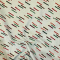 Scarf Closet quilting cotton — tossed striped knitted scarves in red, green, pink and charcoal on a white background. Phoebe Fabrics Wintry collection, 43/44″ wide. Canadian.