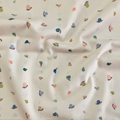 100% cotton quilting fabric — pastel peach, lavender, sky blue & green shells on beige. 43/44in width.