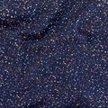 100% cotton quilting fabric — multicolour speckles on navy blue. 44/45in width.