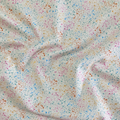 100% cotton quilting fabric — multicolour speckles on cream. 44/45in width.